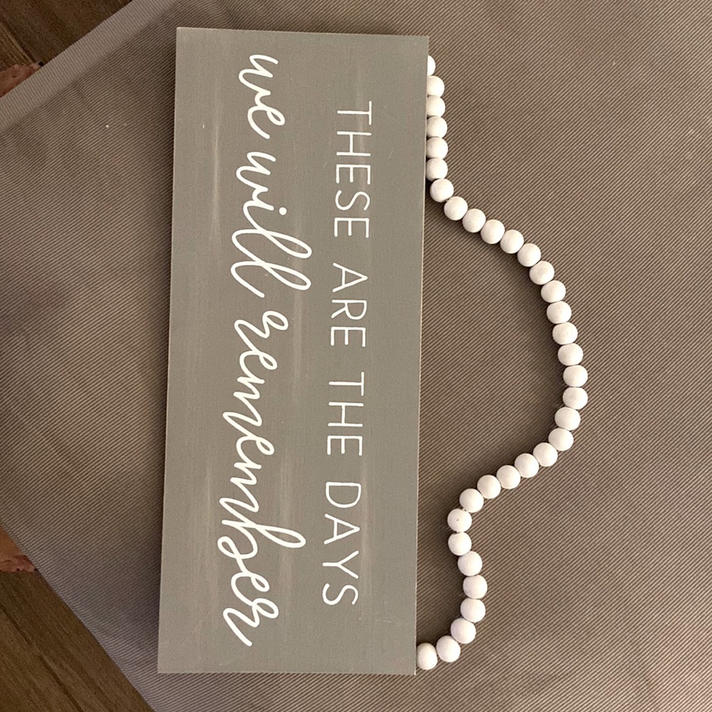 Wooden sign. Grey with white bead hanger.